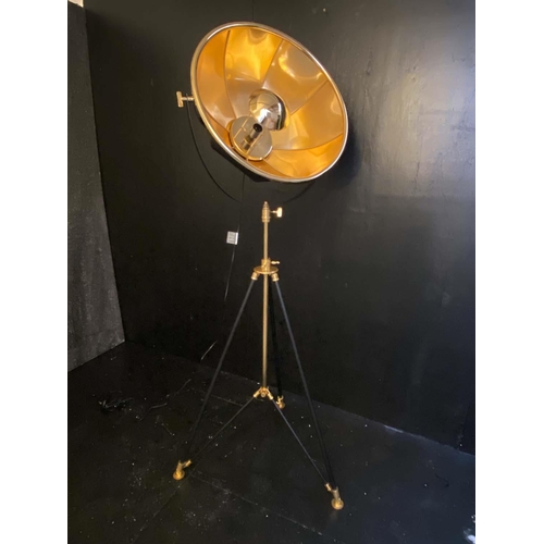 424 - TRIPOD STUDIO LAMP, 180cm high, 52cm diameter, gilt metal shade, adjustable height.