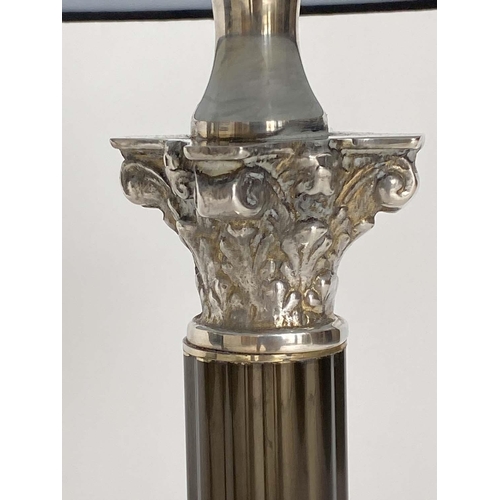 78 - COLUMN LAMPS, a pair, Neo Classical form silvered metal mounted with Corinthian capped columns and s... 