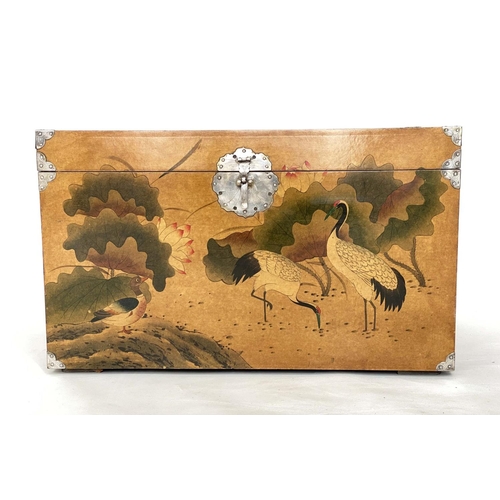 85 - TRUNK, Chinese sienna lacquered with painted cranes and silvered metal mounts, 80cm W x 40cm D x 40c... 