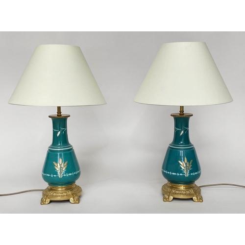90 - TABLE LAMPS, a pair, Chinese jade green ceramic and gilt of graduated form with gilt metal base, 60c... 
