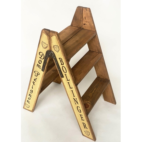 110 - CHAMPAGNE STEPS, hinged A-frame, four tread with champagne house insignia, 80cm H x 44cm D x 69cm W.