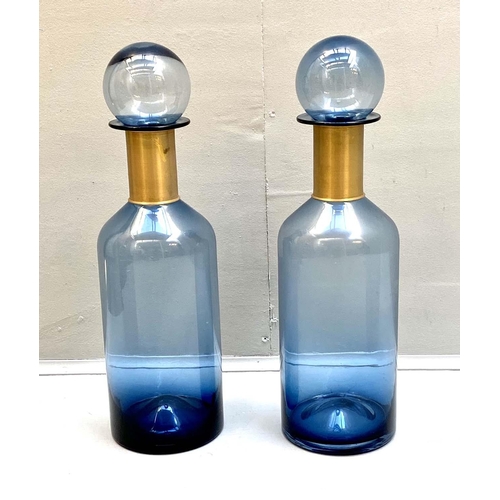 437 - DECANTERS, a pair, 52cm H x 15cm diam., Murano style blue glass, gilt metal collars. (2)