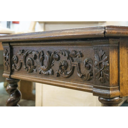 131 - WRITING TABLE, 73cm H x 134cm W x 73cm D, late 19th/early 20th century French oak with two drawers.