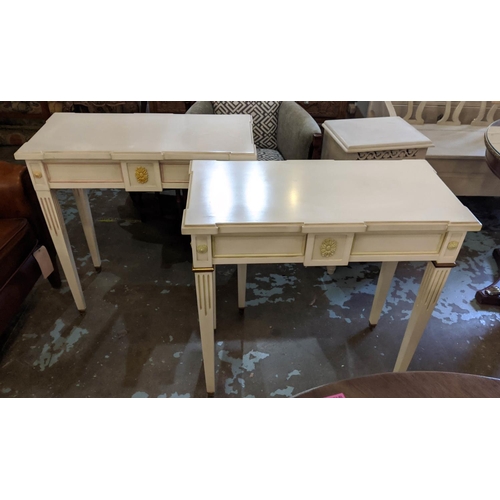 129 - CONSOLE TABLES, a pair, each 40cm x 80cm x 81cm H, one cream and lime painted, the other cream and p... 