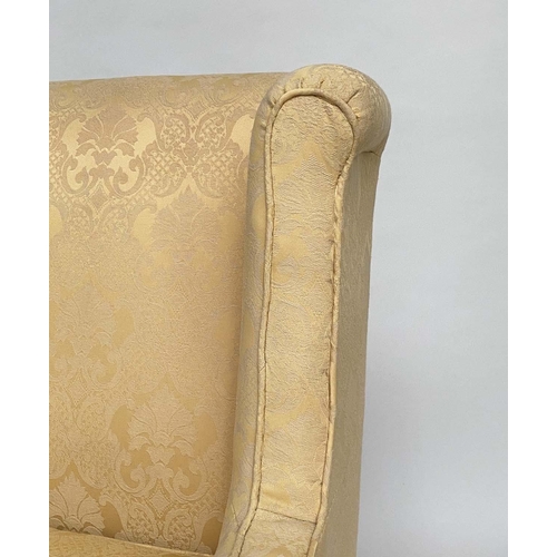 148 - WINGBACK ARMCHAIR, Edwardian piped yellow brocade upholstery and tapering supports, 72cm W.