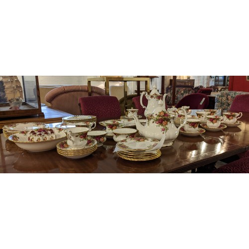 15 - ROYAL ALBERT 'OLD COUNTRY ROSES' TEA SERVICE, including twelve tea cups and saucers, a teapot, coffe... 