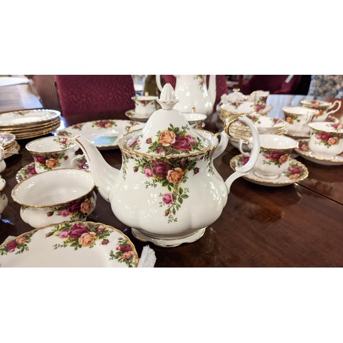 15 - ROYAL ALBERT 'OLD COUNTRY ROSES' TEA SERVICE, including twelve tea cups and saucers, a teapot, coffe... 