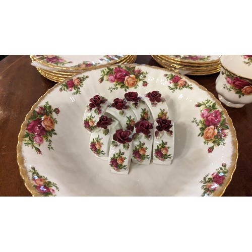 15 - ROYAL ALBERT 'OLD COUNTRY ROSES' TEA SERVICE, including twelve tea cups and saucers, a teapot, coffe... 