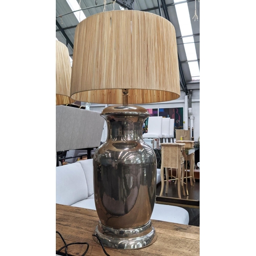 333 - TABLE LAMPS, a pair, polished metal urn design, with shades, 91cm H. (2)