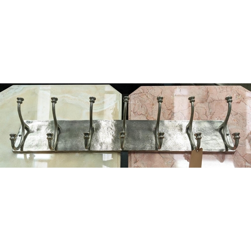 334 - WALL MOUNTING COAT RACK, polished metal, with fourteen hooks, 100cm L.