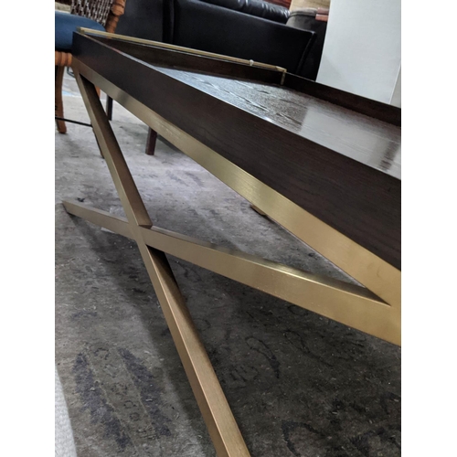 313 - COCKTAIL TABLE, 140cm x 51cm, gilt metal X frame design.