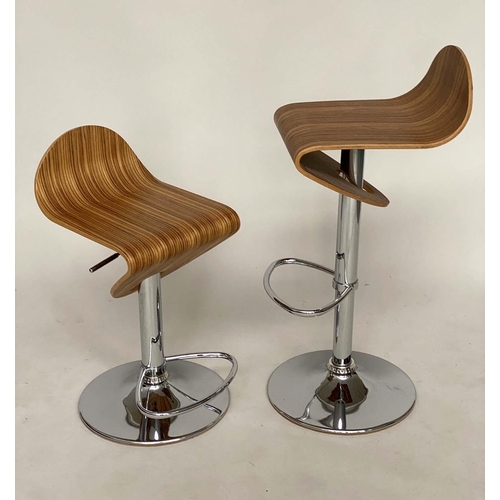 271 - BARSTOOLS, a pair, 1970s style veneered bentwood revolving on height adjustable chrome base with foo... 