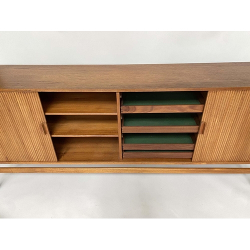 274 - SIDEBOARD, mid 20th century teak, with tambour sliding front enclosing four shelves and four sliding... 