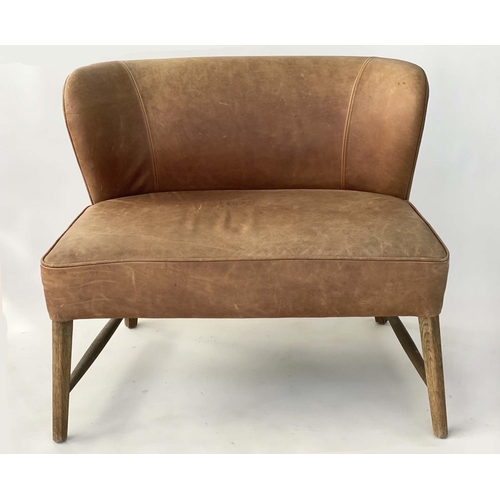 277 - OKA LOUNGE CHAIR, stitched and piped leather on stretchered splay supports, 140cm W.