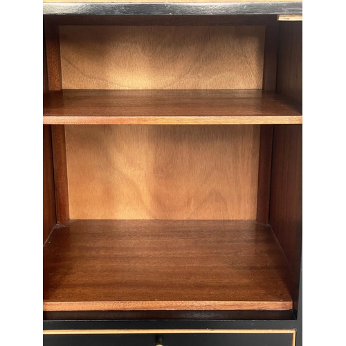 278 - LOUGHBOROUGH FURNITURE SIDE CABINETS, a pair, 1960s satinwood and ebonised each with panelled door a... 