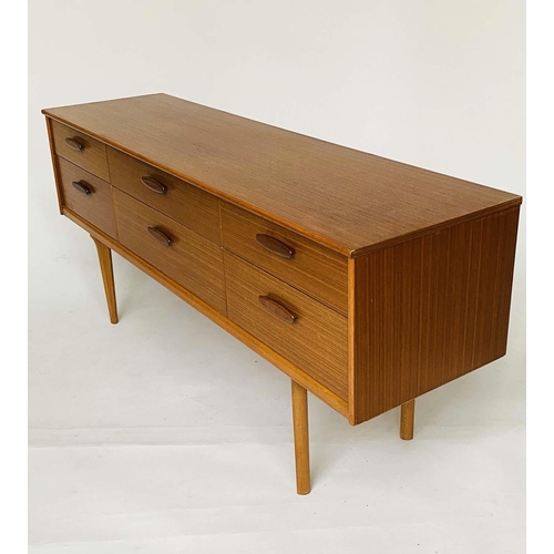 279 - LOW CHEST, 1970s Danish style teak with six short drawers, 154cm W x 69cm H x 44cm D.