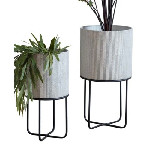 416 - PLANTERS ON STANDS, two graduated pairs, in aged white finish, 30cm diam. x 58cm at largest. (4)