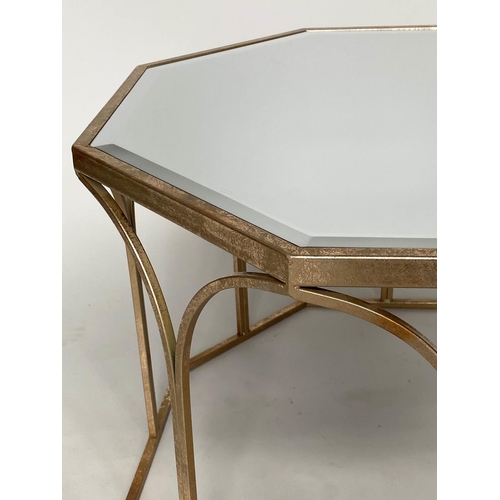 382 - LOW TABLE, octagonal mirror glazed with gilt metal supports, 80cm W x 50cm H.