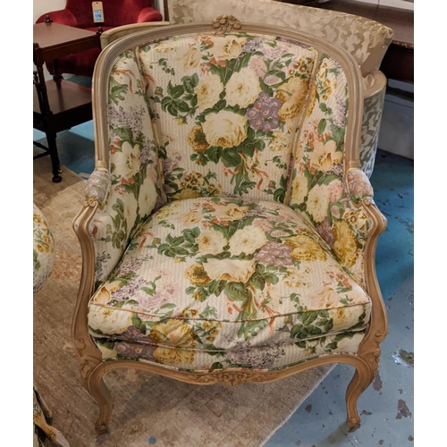 162 - KIDNEY SHAPED SOFA, 155cm W x 80cm H, in a floral fabric and a bergere with carved showframe and mat... 