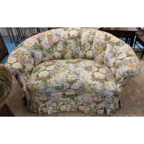 162 - KIDNEY SHAPED SOFA, 155cm W x 80cm H, in a floral fabric and a bergere with carved showframe and mat... 