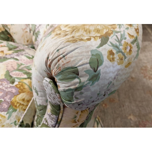 162 - KIDNEY SHAPED SOFA, 155cm W x 80cm H, in a floral fabric and a bergere with carved showframe and mat... 