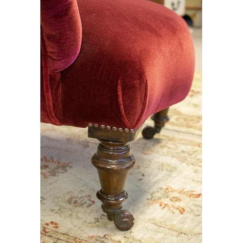 178 - ARMCHAIR, 85cm H x 79cm, Victorian in dark red velvet on ceramic castors.