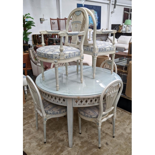 323 - DINING SET INCLUDING CIRCULAR TABLE, 78cm x 126cm, with a lattice frieze in a distressed painted fin... 