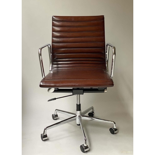 100 - REVOLVING DESK CHAIR, Charles and Ray Eames inspired with ribbed mid brown leather seat, revolving a... 