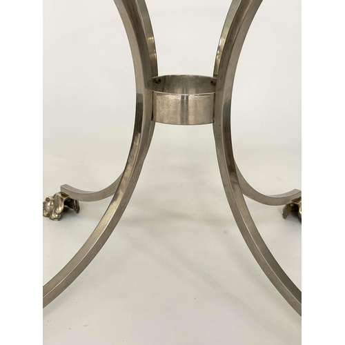 102 - CENTRE/DINING TABLE, circular glass raised upon chromed and silver metal outswept supports with paw ... 