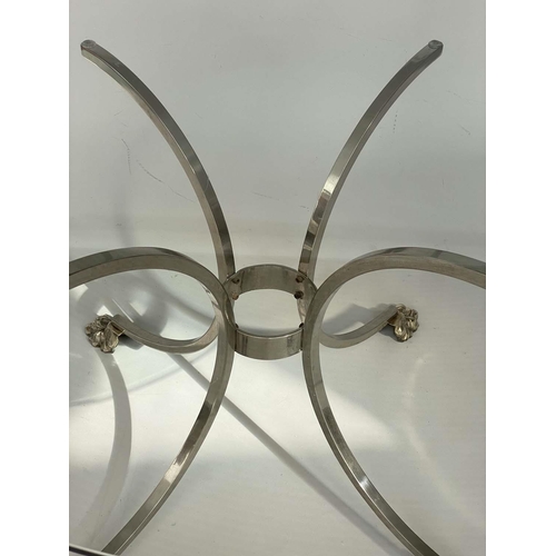 102 - CENTRE/DINING TABLE, circular glass raised upon chromed and silver metal outswept supports with paw ... 