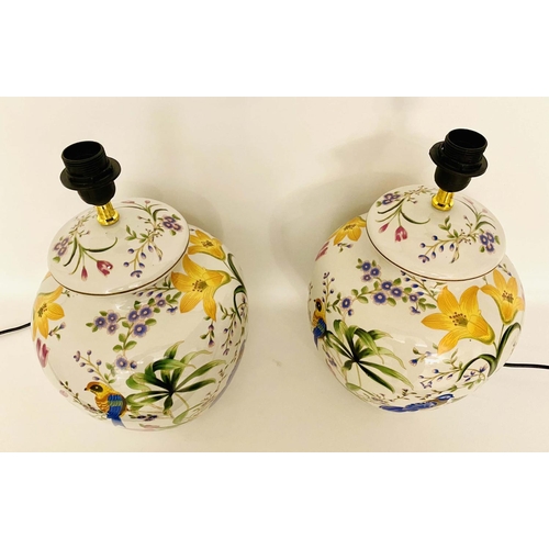 400 - TABLE LAMPS, a pair, 46cm high, glazed ceramic with foliate and bird print design. (2)