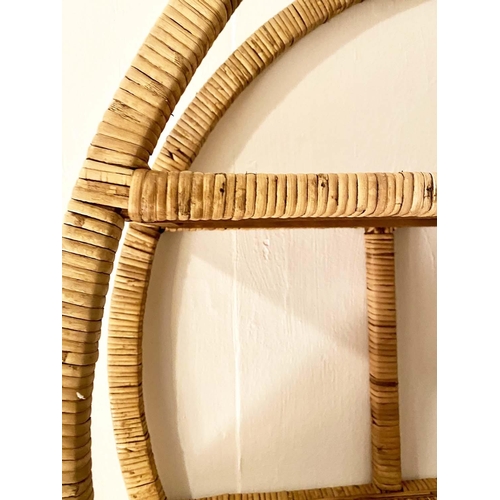 406 - RATTAN WALL ETAGERE, 78cm diameter, 19cm deep, 1970s Italian style.