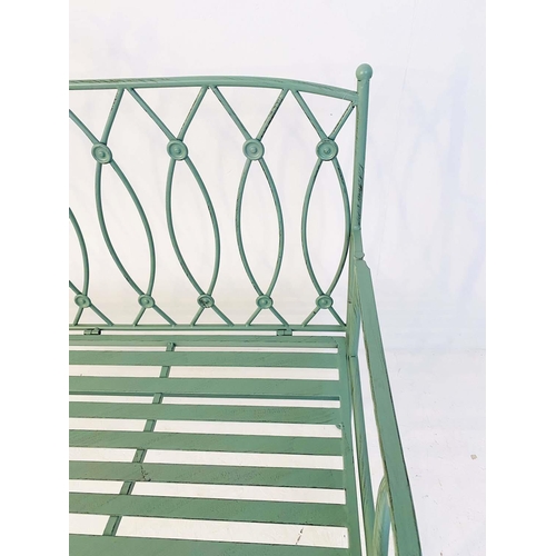 407 - GARDEN BENCH, 95cm high, 105cm wide, 54cm deep, Regency style, painted pistachio green metal.