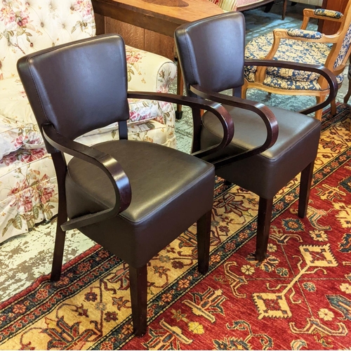 377 - DINING CHAIRS, a set of ten each 55cm W, brown leather with arms.