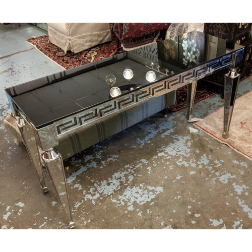 380 - CONSOLE TABLE, 45cm D x 140cm L x 77cm H, smoked glass top, polished metal base with Greek key desig... 