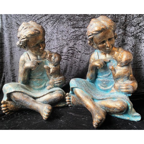 294 - CONTEMPORARY SCHOOL SCULPTURAL STUDIES, girl with puppy dog, a pair, gilt and faux verdigris finishe... 