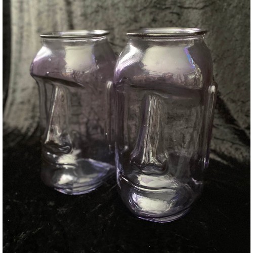 296 - RAPS NUI STYLE VASES, a pair, lilac tinted glass, 35cm high.