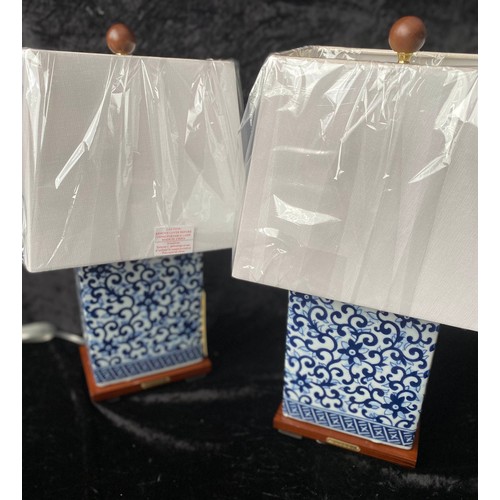 298 - LAUREN RALPH LAUREN HOME TABLE LAMPS, a pair, Chinese export style blue and white ceramic, with shad... 