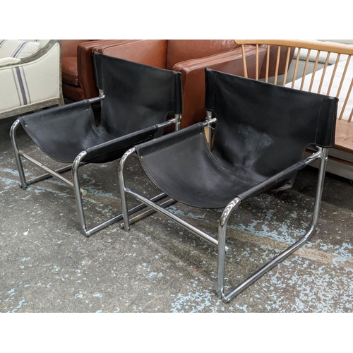 424 - LOUNGE CHAIRS, a pair, 78cm W, vintage 1970s, leather and chrome. (2)