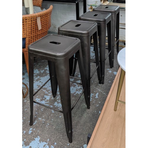 437 - AFTER XAVIER PAUCHARD TABOURET INSPIRED STOOLS, a set of four, 77cm H. (4)