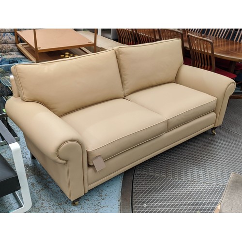 438 - SOFA, caramel leather upholstered, 210cm x 100cm x 82cm.