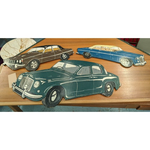 440 - VINTAGE CAR WALL PANELS, 20th century polychrome finish, 89cm x 44cm at largest. (3)