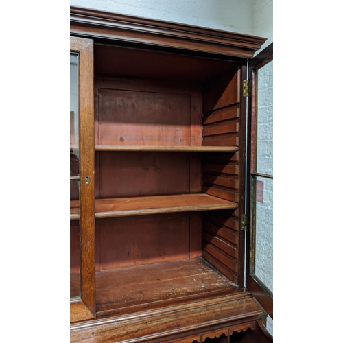 215 - SECRETAIRE BOOKCASE, 110cm W x 45cm D x 188cm H, George III mahogany with two glazed doors, adjustab... 