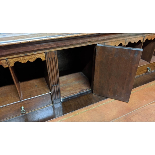 215 - SECRETAIRE BOOKCASE, 110cm W x 45cm D x 188cm H, George III mahogany with two glazed doors, adjustab... 