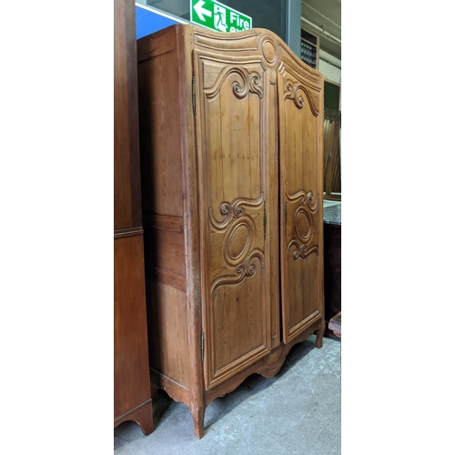 212 - ARMOIRE, 123cm W x 207cm H x 49cm D, 18th century French, pine carved panelled doors.