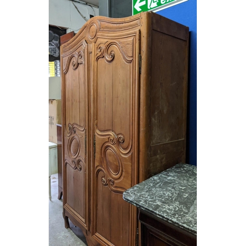 212 - ARMOIRE, 123cm W x 207cm H x 49cm D, 18th century French, pine carved panelled doors.