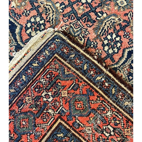 130 - ANTIQUE FEREGHAN RUNNER, 498cm x 101cm.