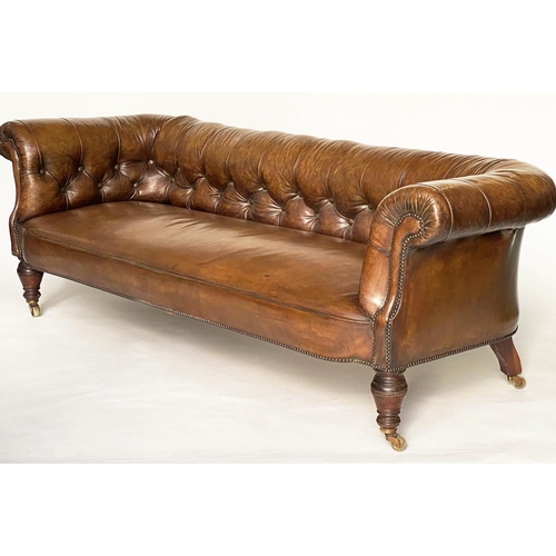 181 - CHESTERFIELD SOFA, Victorian mahogany with faded tan brown brass studded leather with button back an... 