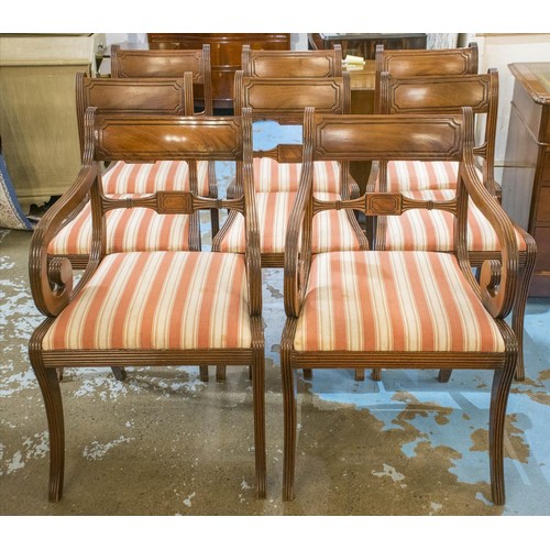 260 - DINING CHAIRS, a set of eight Regency mahogany including two armchairs with striped drop in seats (o... 