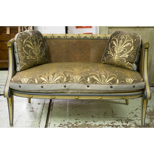 261 - CANAPE, 19th century Regency design cream, green lined and gilt anthemion leaf framed bergere cane p... 